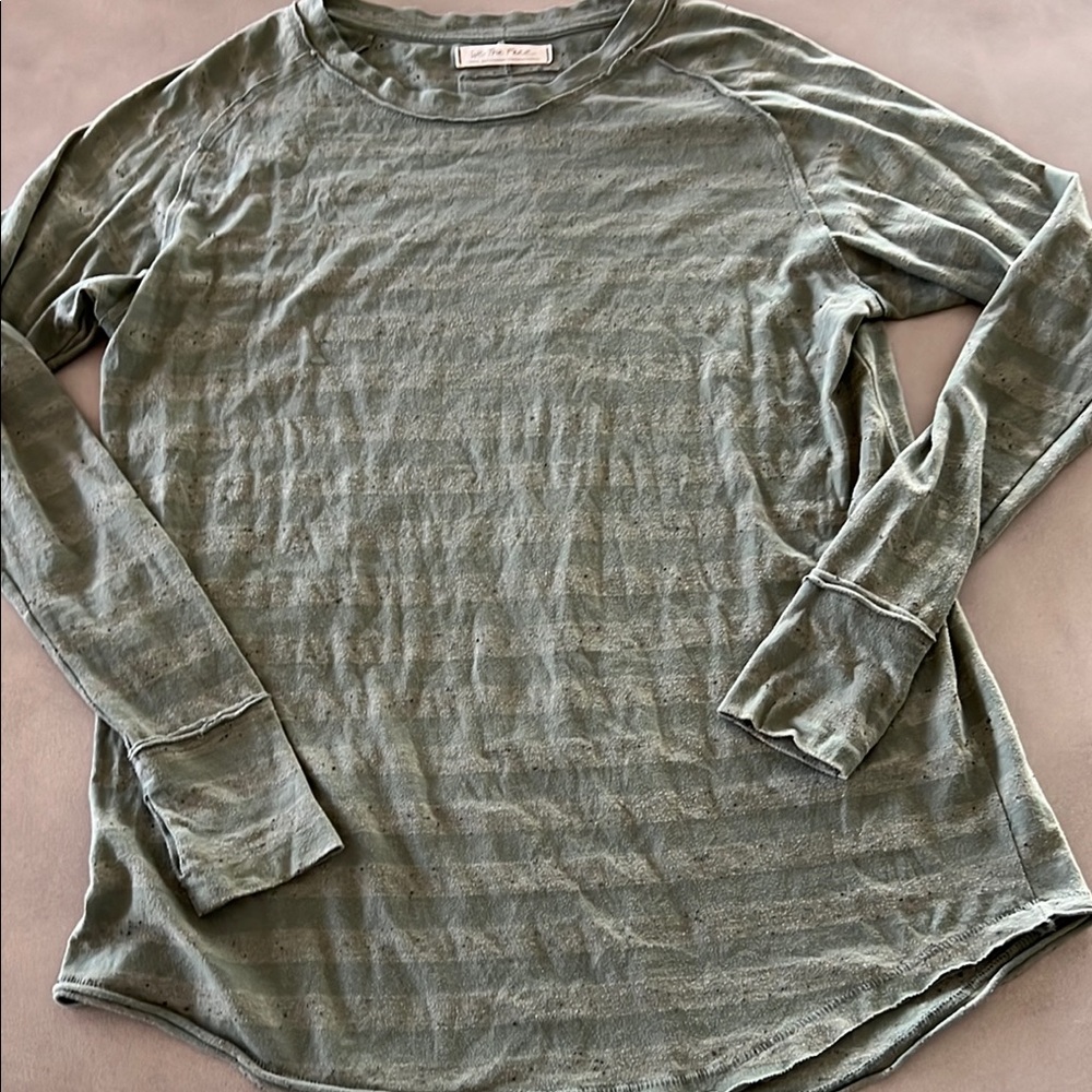 Like new womens top by We the Free in size S